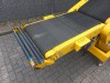 Best Power Loader verrijdbare vrachtauto losser/lader met aangedreven harmonica rollenbaan van 8,5 meter voor het efficiënt laden en lossen van vrachtwagens en containers.