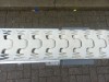 FlexLink transportband met een lengte van 5,3 meter. Modulair opgebouwd en eenvoudig in lengte aan te passen voor flexibele integratie in productielijnen.
