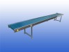Gebruikte GEA transportband van 5 meter lang met een bandbreedte van 50 cm en hoogte verstelbare ondersteuningen van 73 tot 100 cm.