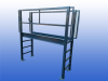 Rollenbaan trapbrug 2200 mm hoog met reling en 600 mm loopbreedte