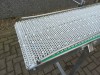 Transportband met 38 cm bandbreedte, besturingskast met aan-uit en hoofdstroomschakelaar, plus bufferfunctie via wieltje