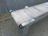 Transportband met RVS frame, kunststof Intralox banddek en drie hoogte verstelbare ondersteuningen