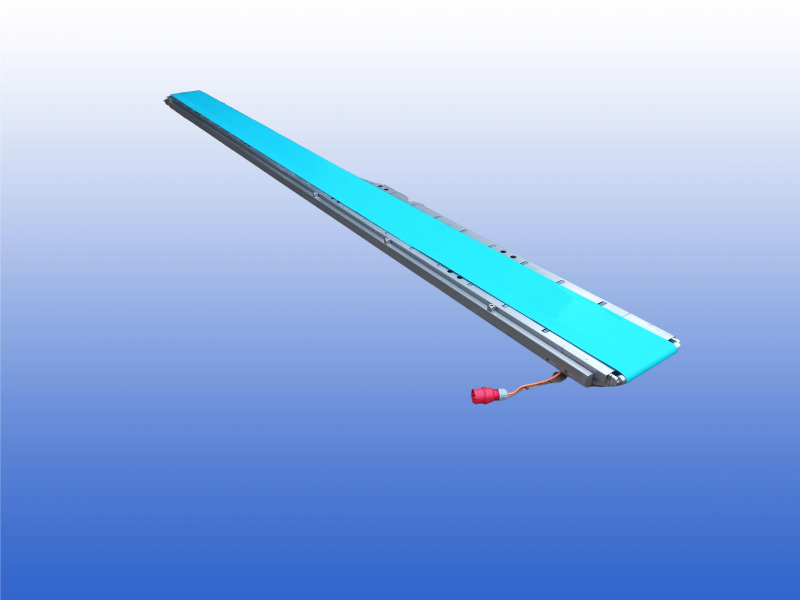 RVS transportband 5,45 meter met 300 mm band en Interroll trommelmotor in koprol