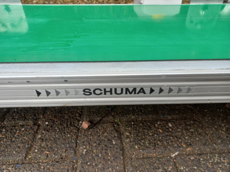 Transportband 1,55 meter lang en 50 cm breed van Schunk met verrijdbaar onderstel